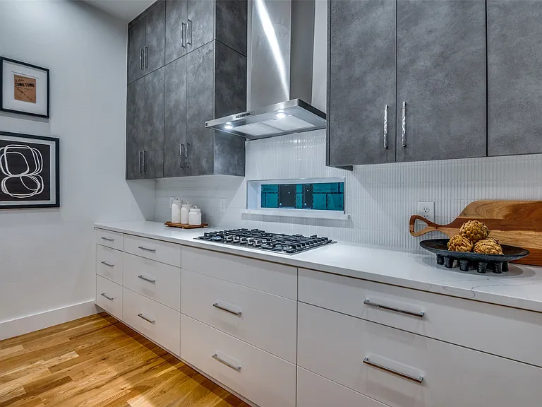 Addison modern kitchen with fluted tile backsplash in full renovation