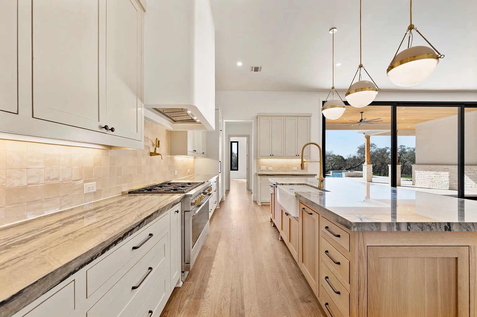 Luxury kitchen remodel with zellige tile backsplash and farmhouse sink in Allen TX by UHS Remodeling