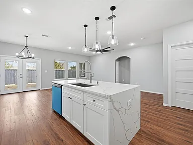 Farmers Branch kitchen waterfall island in full home renovation