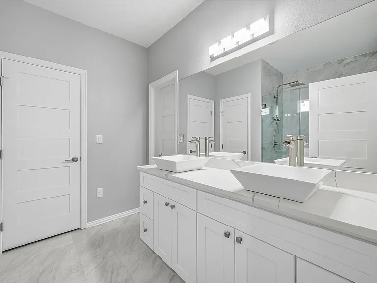 Master bathroom in Farmers Branch home renovation with double vanity