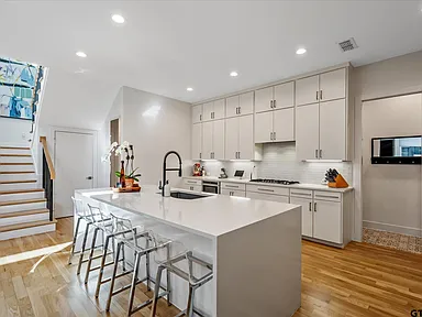 Full view flat panel kitchen cabinets with island Highland Park TX