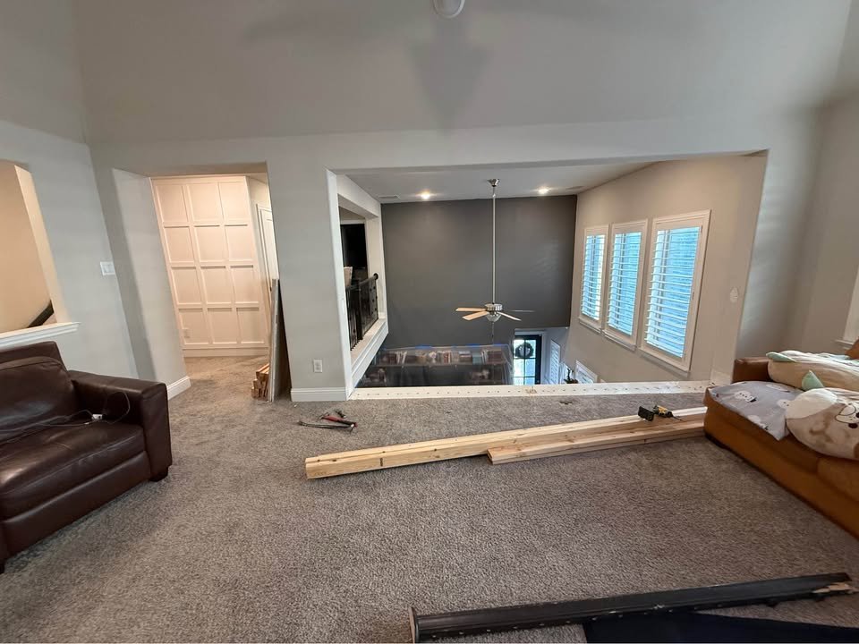 Open loft home addition overlooking existing living room below - Plano TX