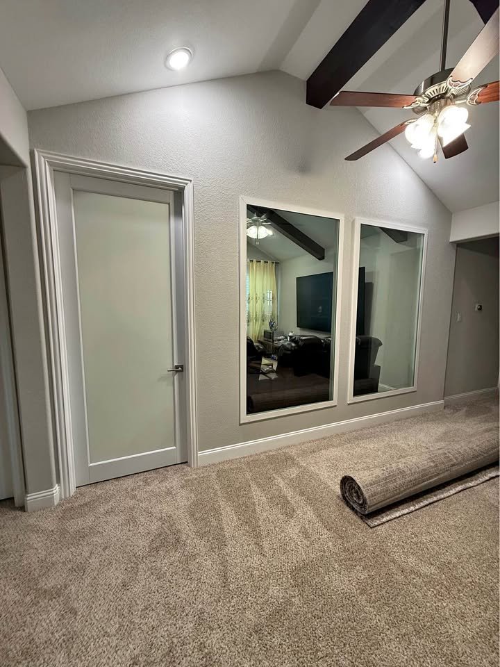 New loft room addition with vaulted ceiling and interior windows - Plano TX