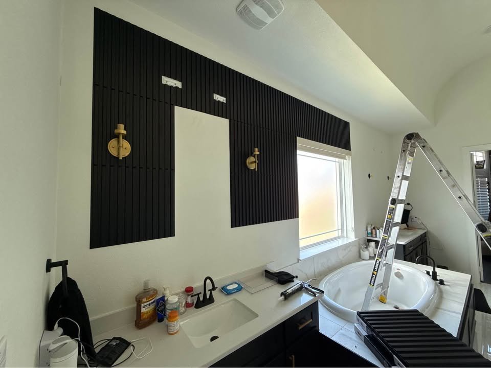 Bathroom addition in progress with black fluted wall and new vanity - Plano TX