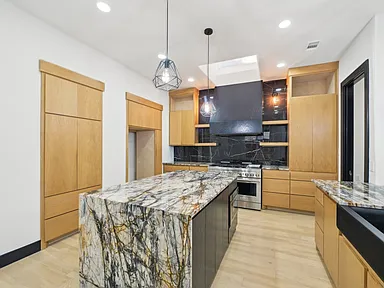 Kitchen remodel with oak cabinets and quartz countertops Plano TX