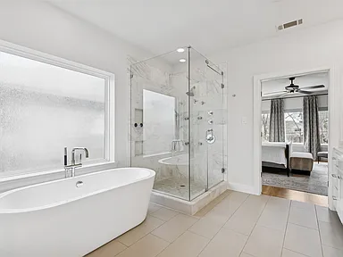 Master bathroom alternate angle freestanding tub corner shower University Park TX