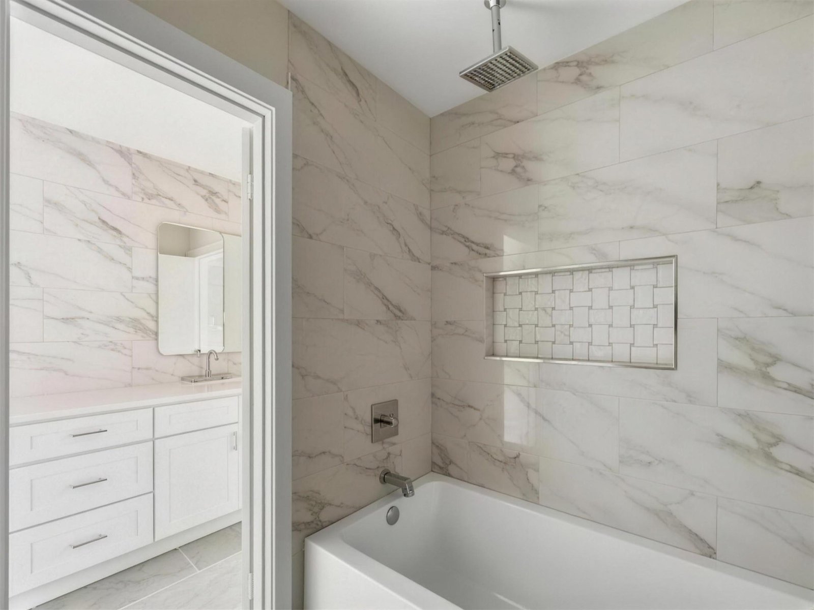 Bathroom remodel in Richardson, TX — alcove tub mosaic niche — UHS Remodeling project