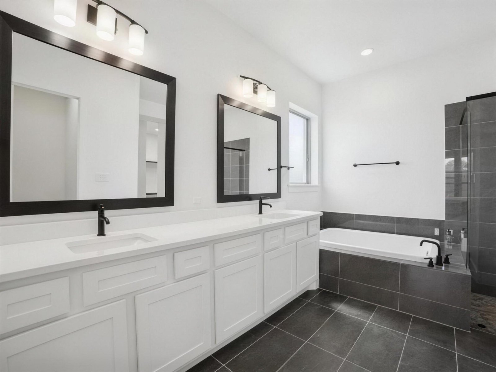 Bathroom remodel in Rockwall, TX — double vanity drop in tub — UHS Remodeling project