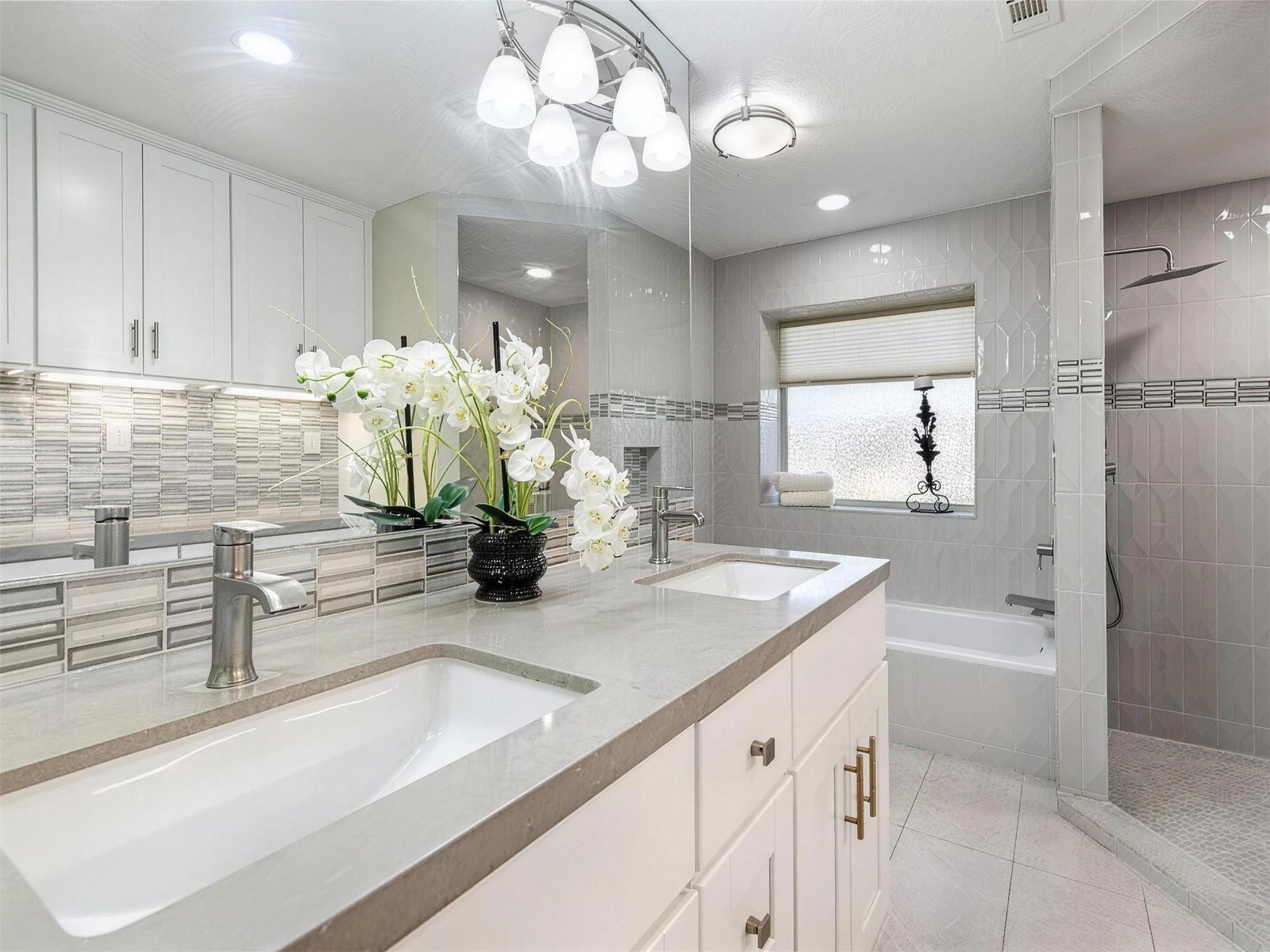 Bathroom remodel in Carrollton, TX — double vanity walk in shower — UHS Remodeling project