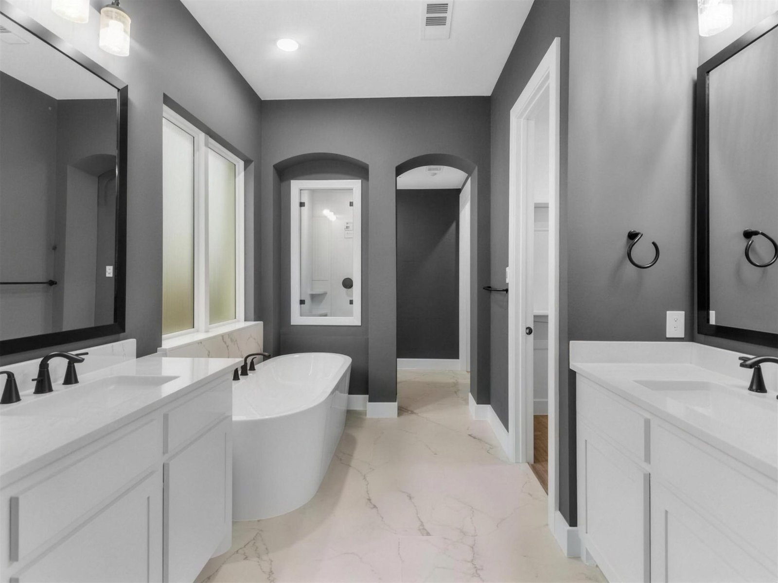 Bathroom remodel in Allen, TX — freestanding tub gray walls — UHS Remodeling project