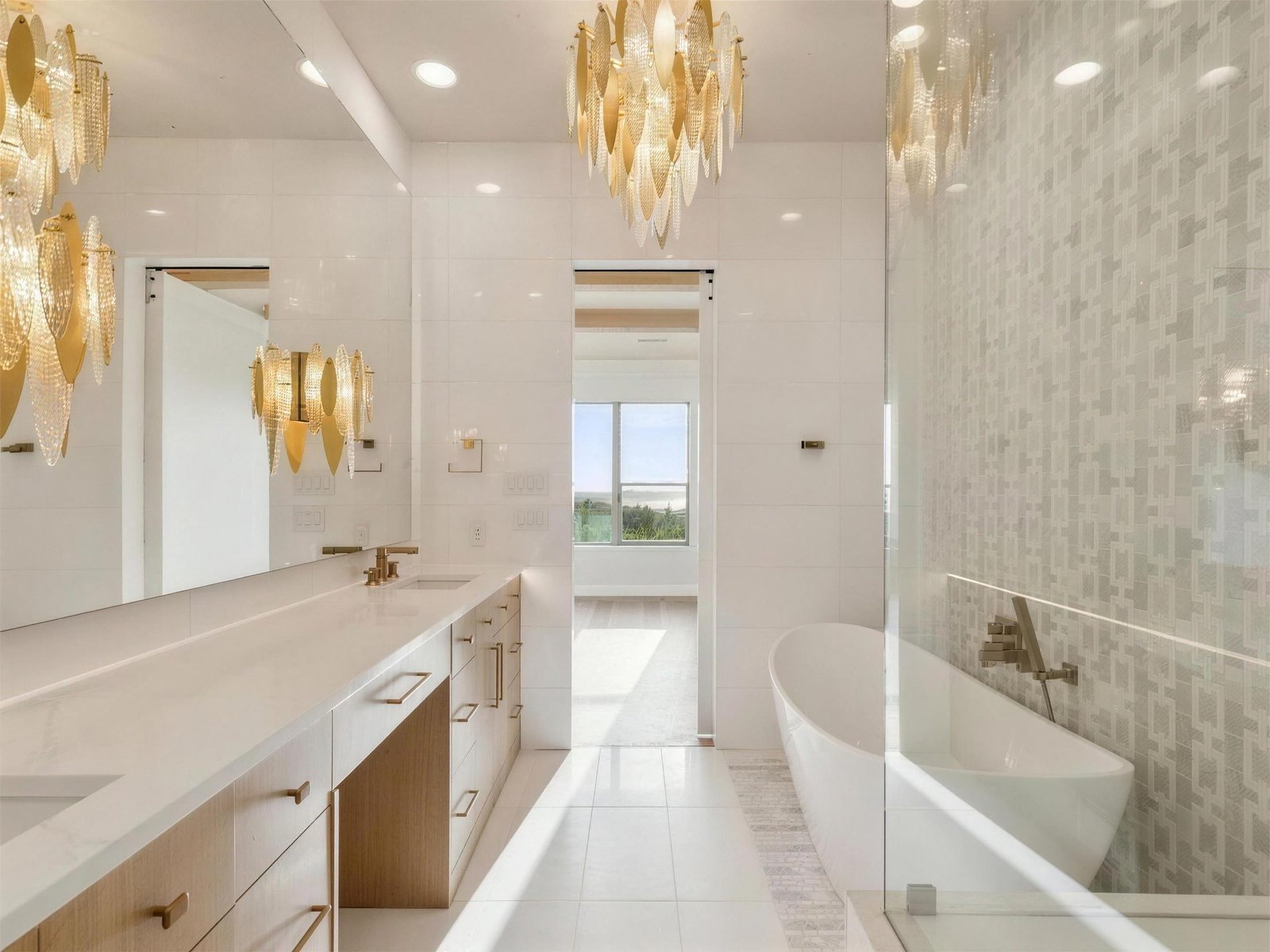 Bathroom remodel in The Colony, TX — gold chandelier freestanding tub — UHS Remodeling project