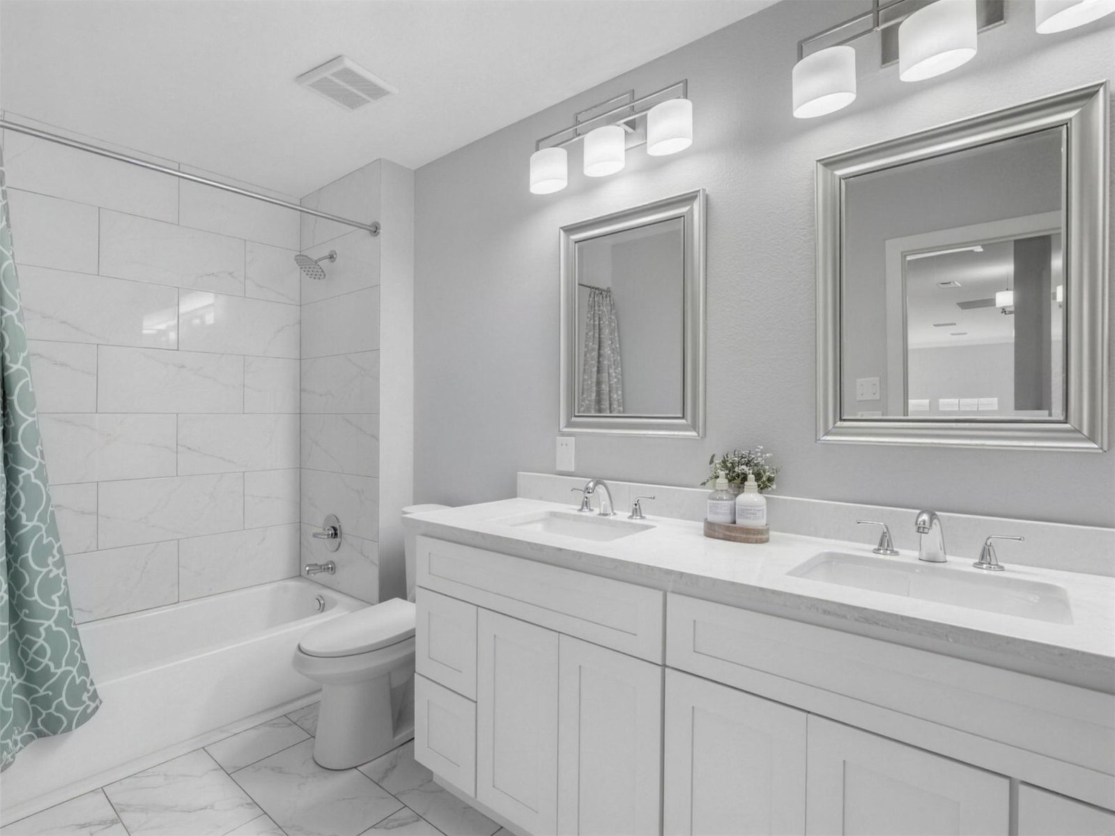 Bathroom remodel in Sachse, TX — marble tub shower combo — UHS Remodeling project