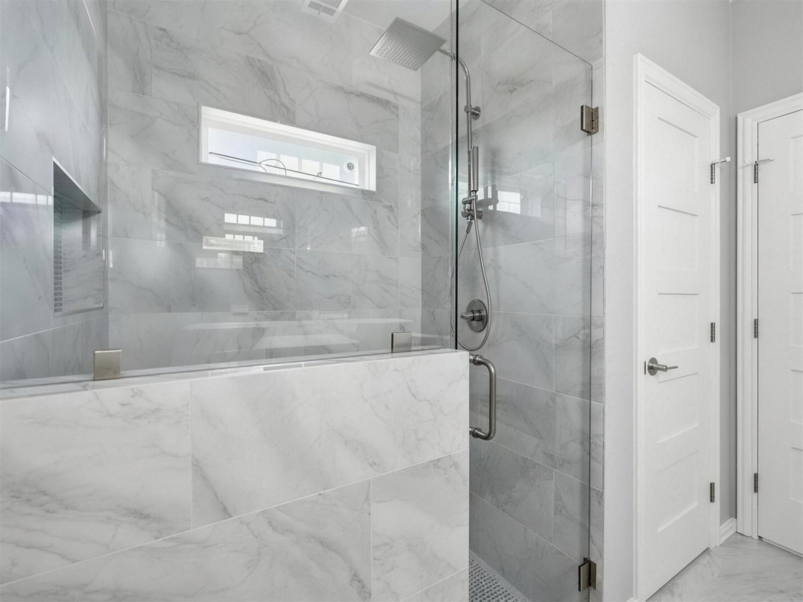 Bathroom remodel in Farmers Branch, TX — marble walk in shower — UHS Remodeling project