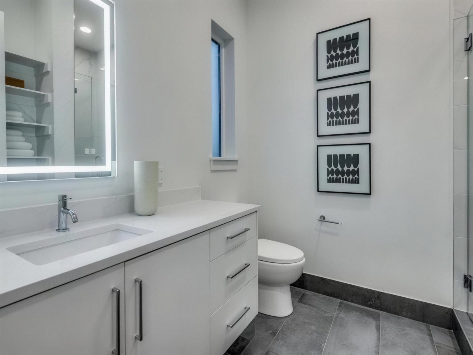 Bathroom remodel in Addison, TX — single vanity slate floor — UHS Remodeling project