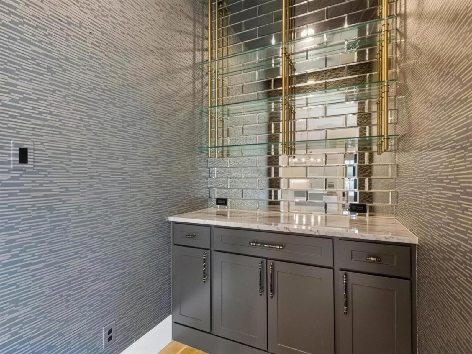 Home remodel in University Park, TX — mirrored tile wet bar — UHS Remodeling project