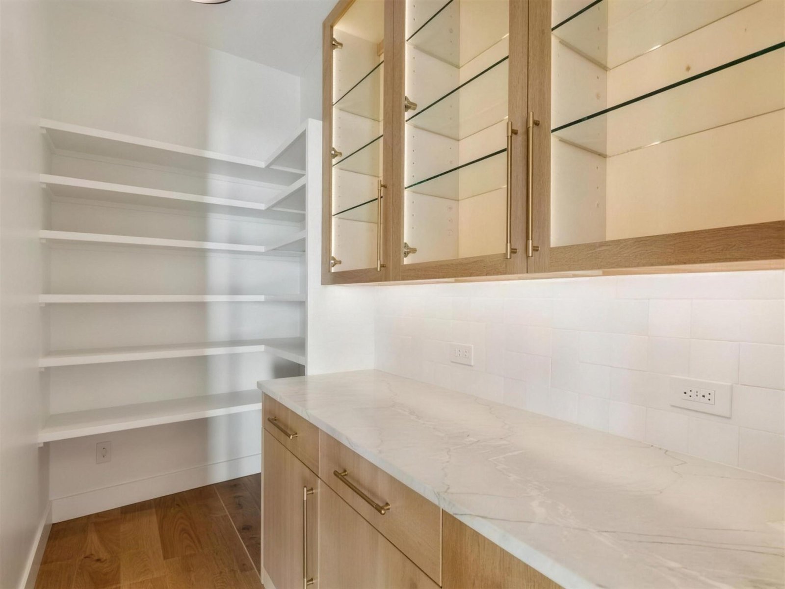 Kitchen remodel in The Colony, TX — butlers pantry glass cabinets — UHS Remodeling project