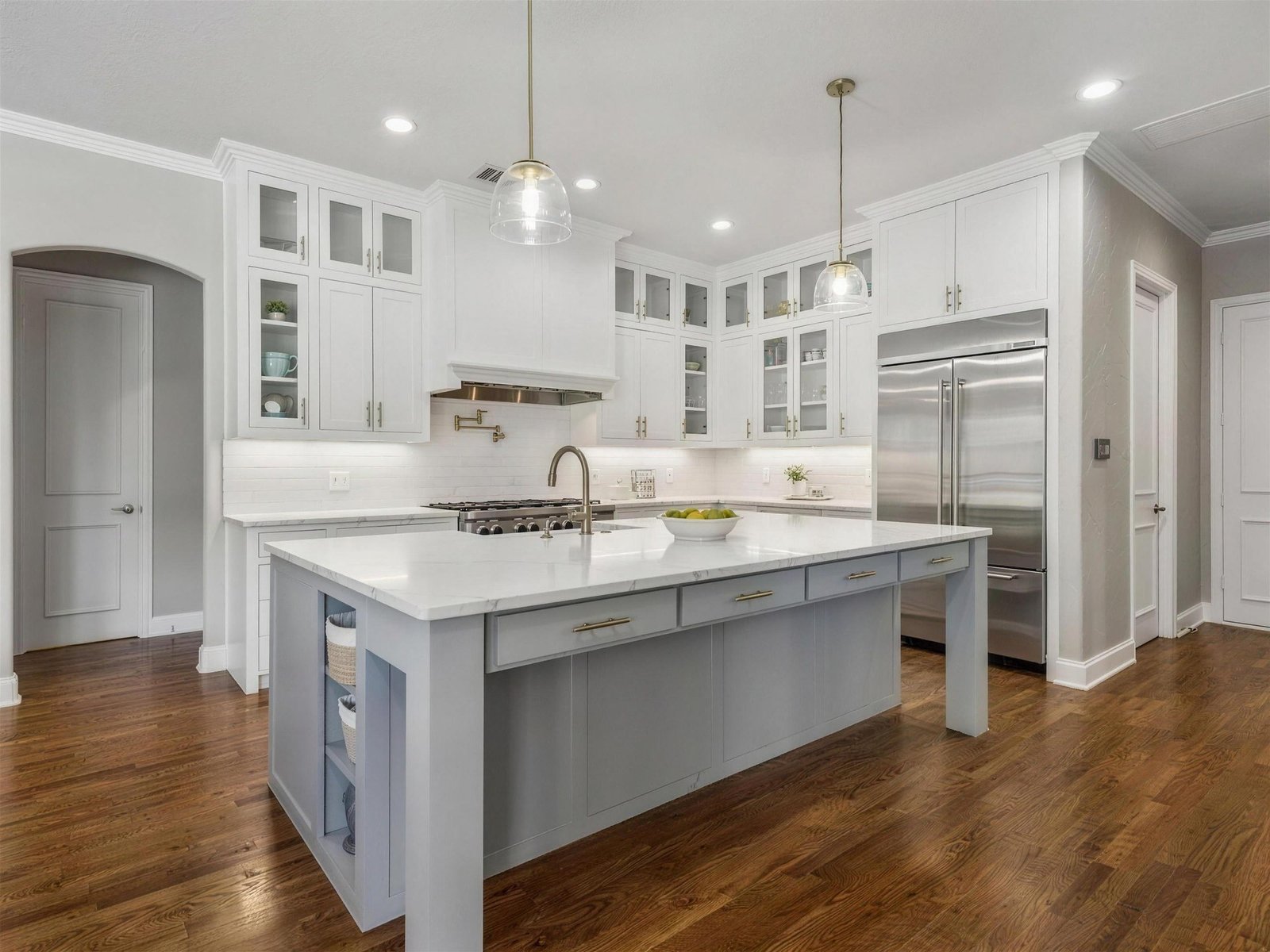 Kitchen remodel in Garland, TX — gray island white quartz — UHS Remodeling project
