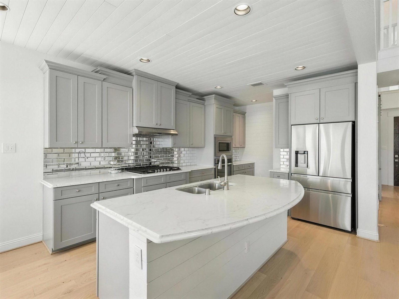 Kitchen remodel in Little Elm, TX — gray shaker shiplap ceiling — UHS Remodeling project