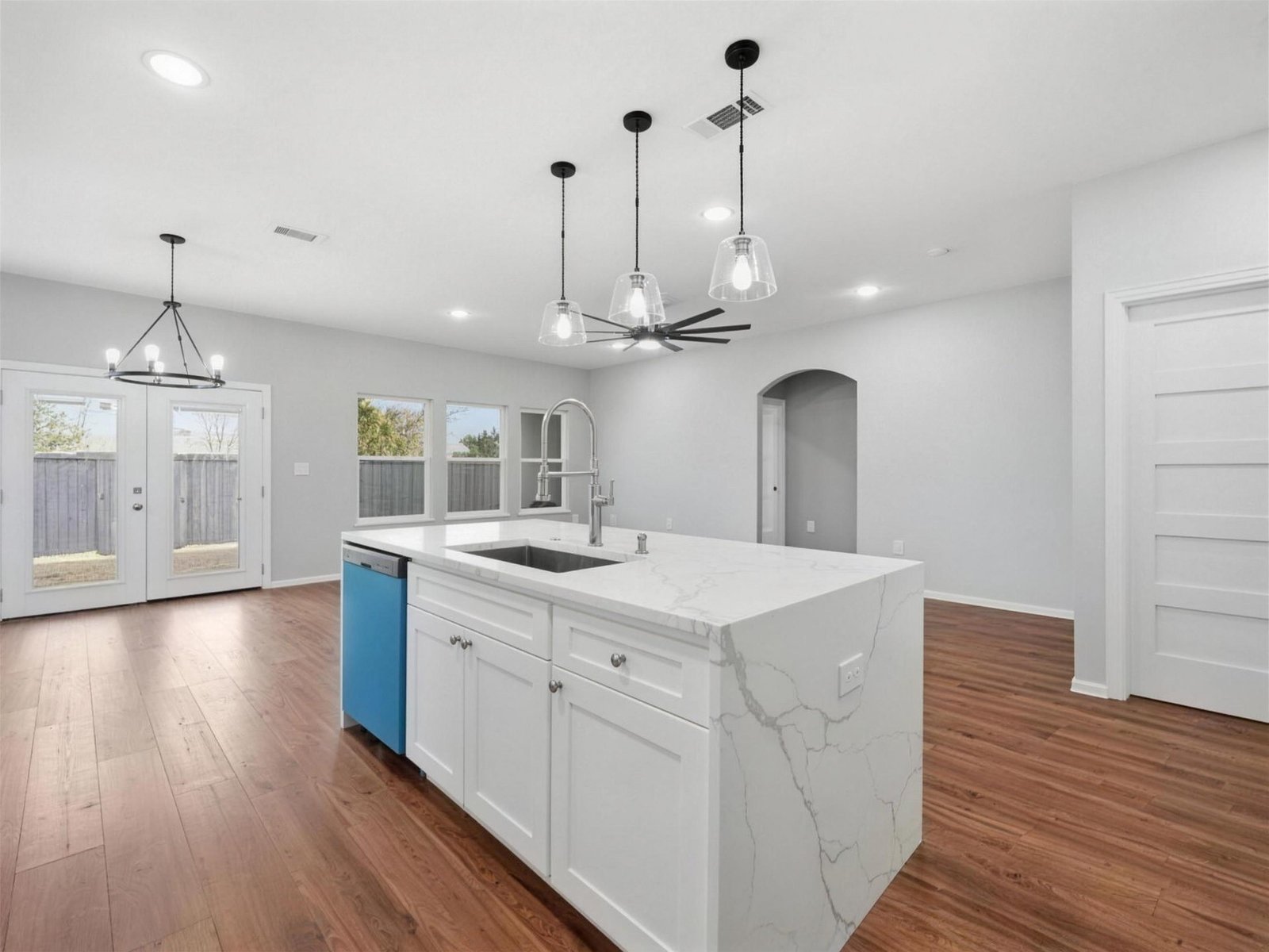 Kitchen remodel in Farmers Branch, TX — quartz island sink side — UHS Remodeling project