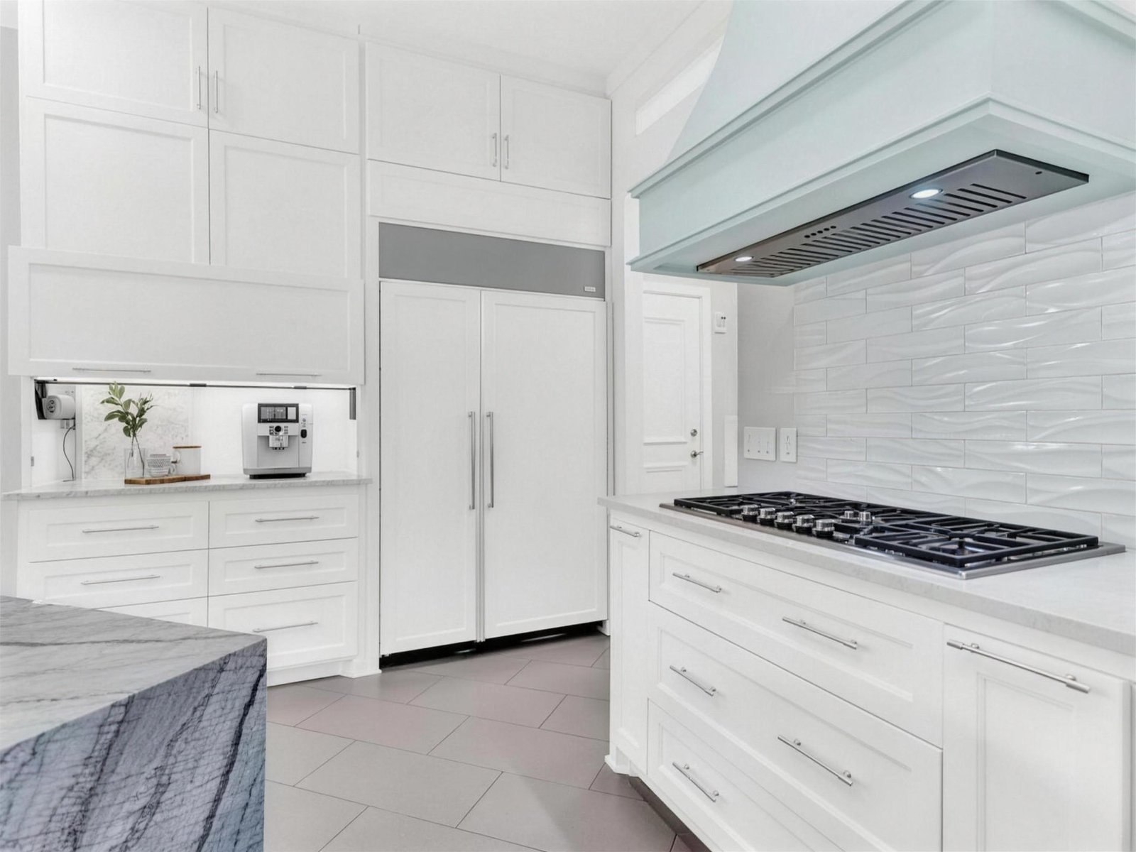 Kitchen remodel in Murphy, TX — white cabinets coffee bar hood — UHS Remodeling project