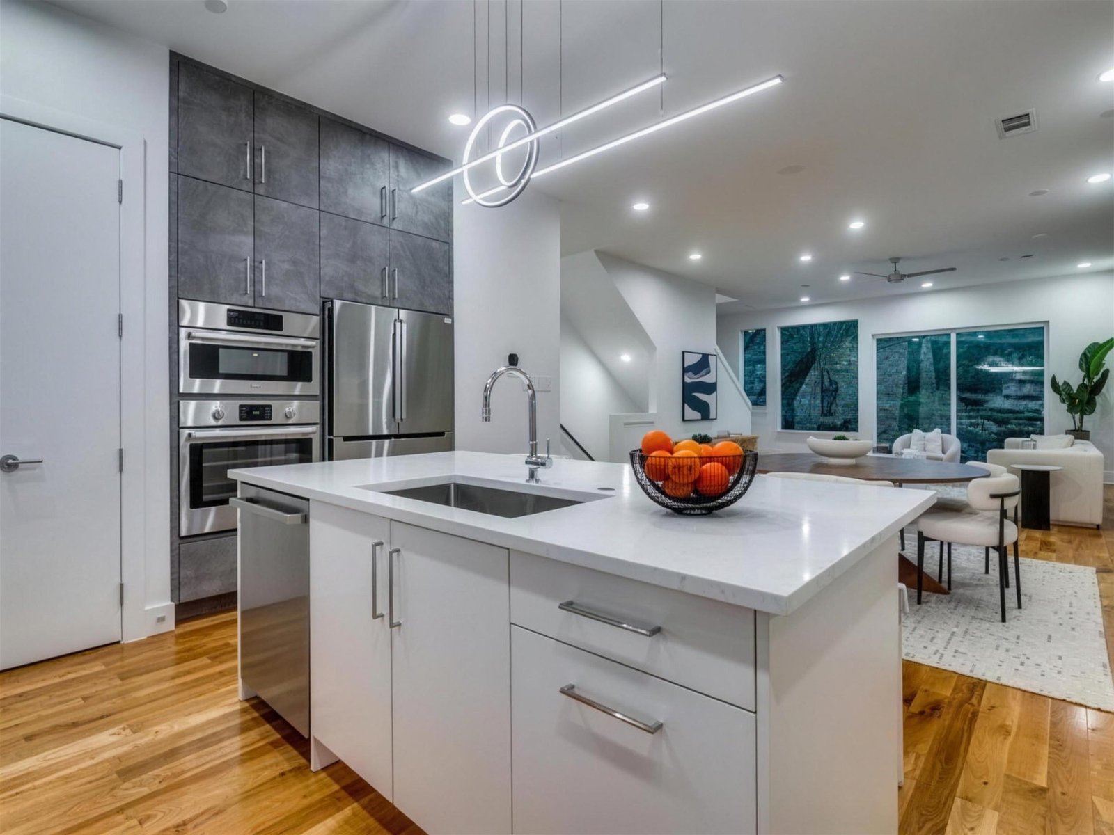 Kitchen remodel in Addison, TX — white island open concept — UHS Remodeling project