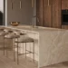 Photorealistic kitchen design render: stone waterfall island with seating, brass pendants, walnut cabinetry - design study