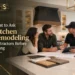Kitchen remodeling contractors discussing plans with homeowners